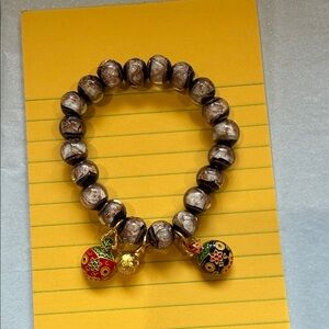 Charming Beaded Bracelet with Gold and Red Accents